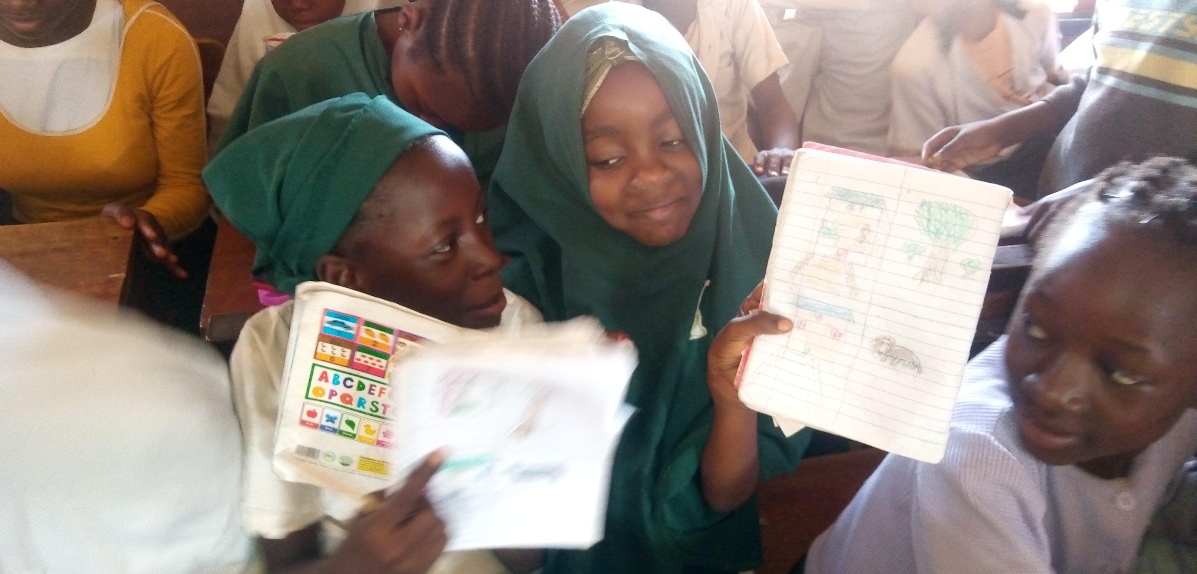 some students reading their notebooks