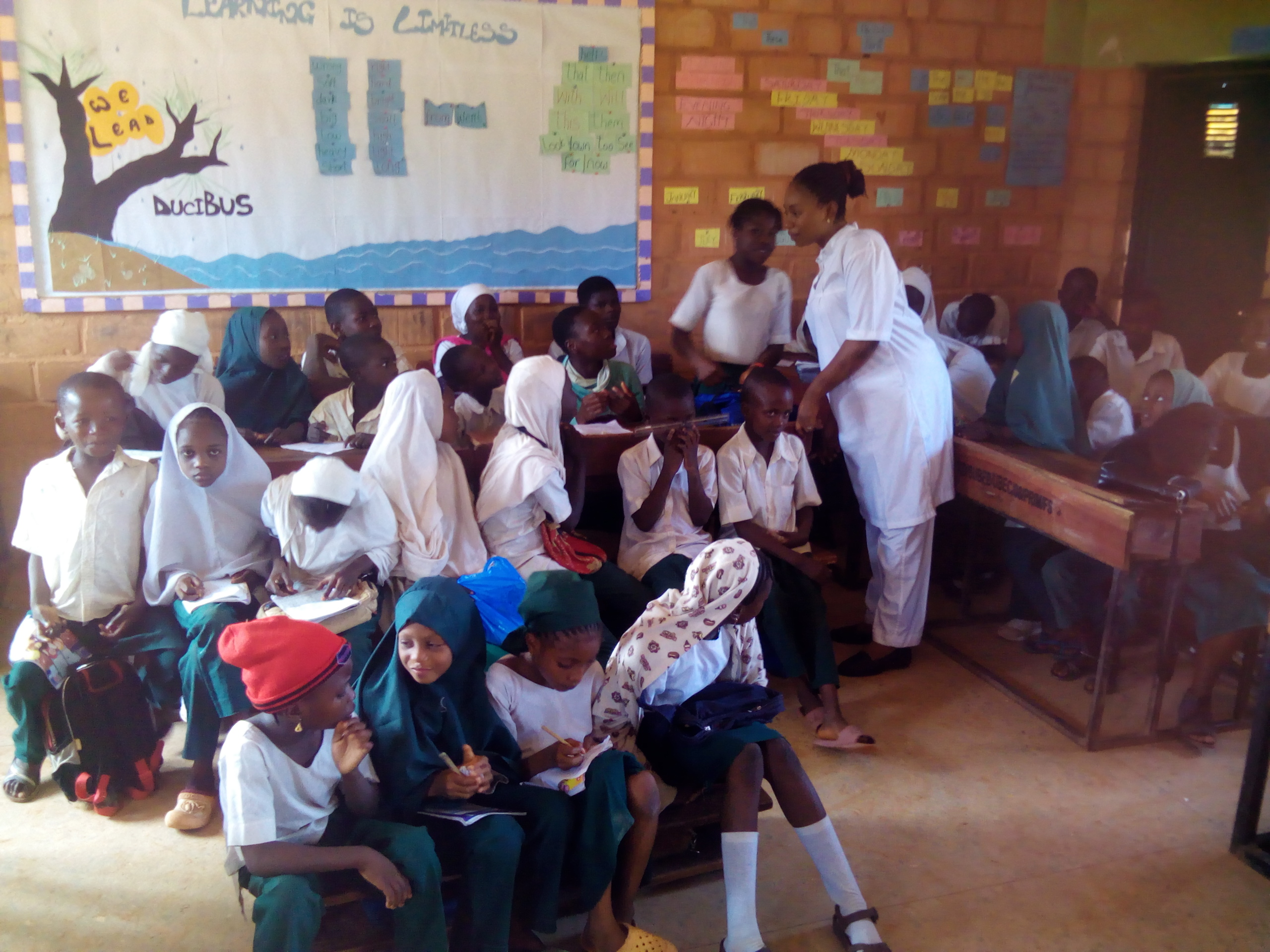 picture of nurse with pupils after a career talk