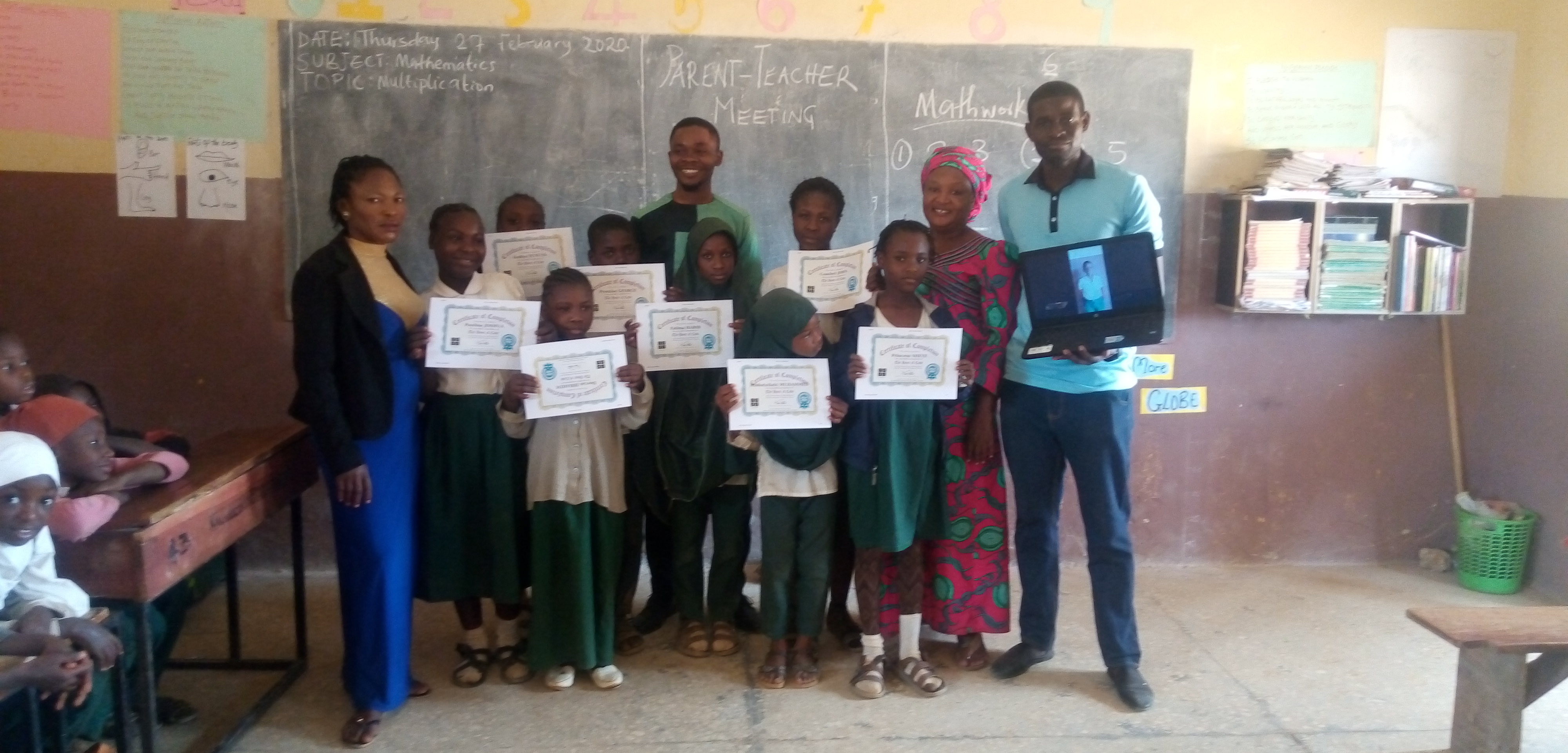 some students displaying their certificates