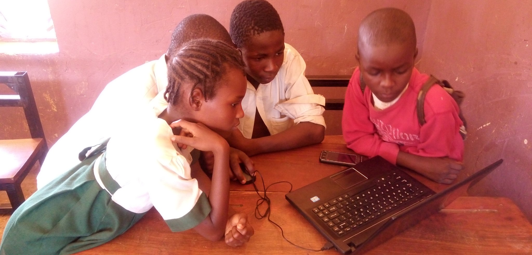 some students studying codes on the system