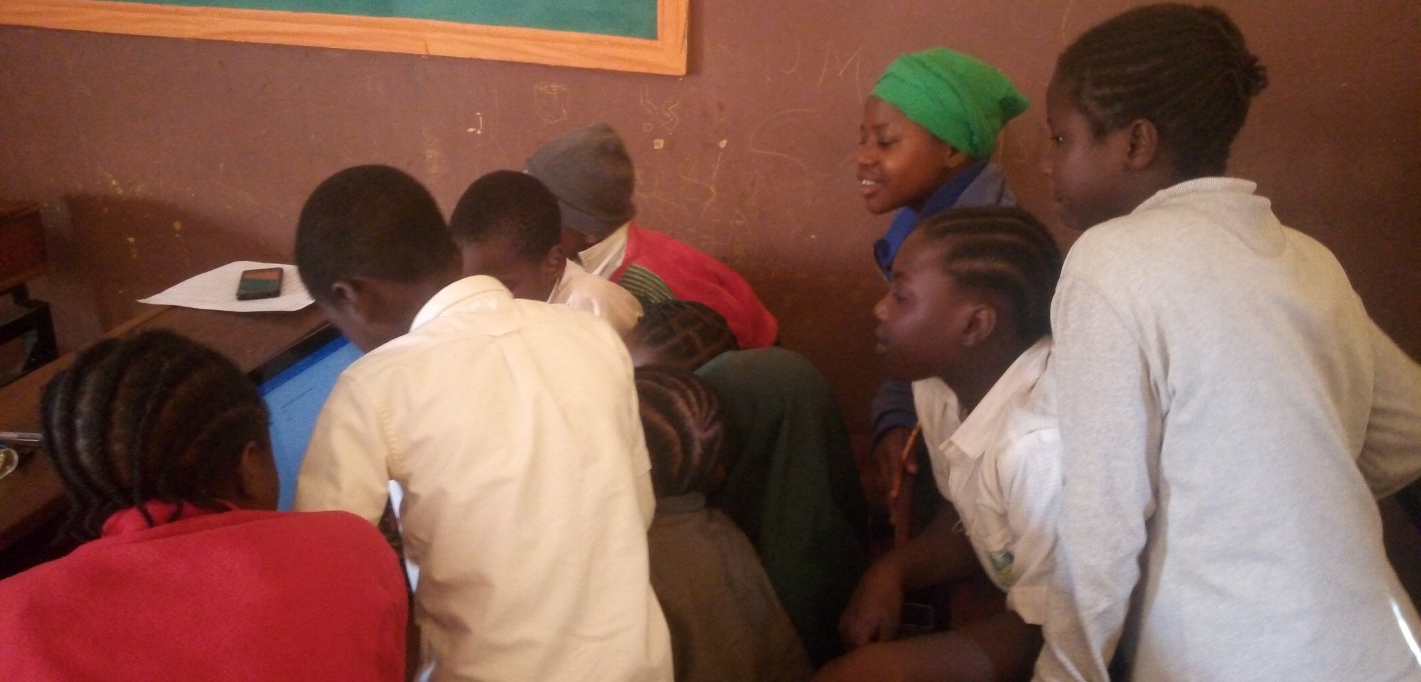 some students studying codes on the system
